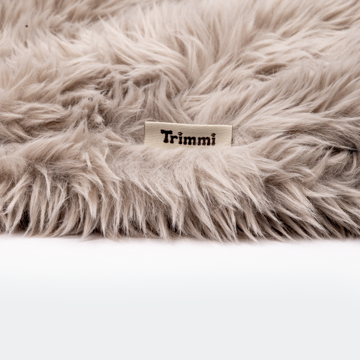Faux fur slaapzak zand